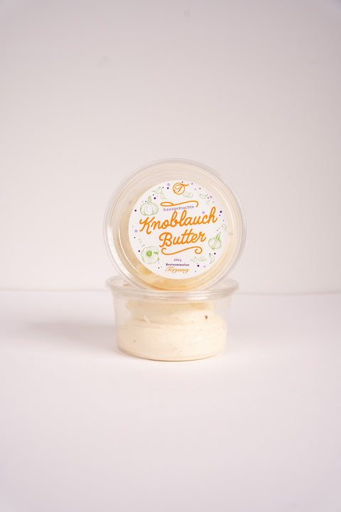 Hausgemachte Knoblauch Butter im Behälter