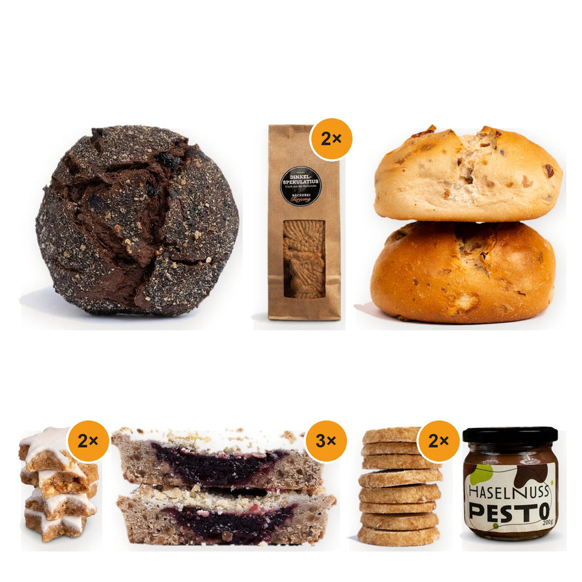 Großes Weihnachtspaket von Terjung: Schwarzwälder Kirschbrot, 2× Dinkelspekulatius, Rosinenstuten, 2× Zimtsterne, 3× Linzer Törtchen, 2× Heidesand und Nuss-Nougat-Pesto
